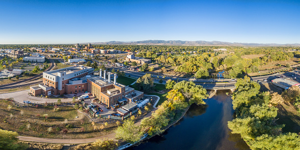 aerial panorama of Fort Collins downtown with the Cache la Poudre River, fall scenery