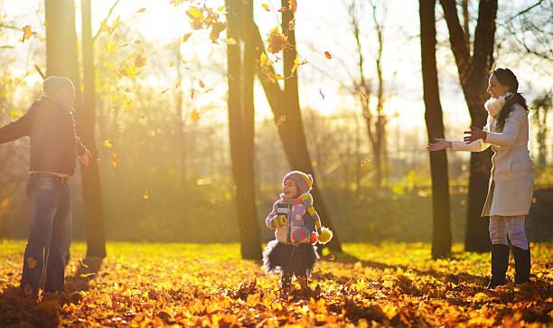 istock Family in autumn park 492851162