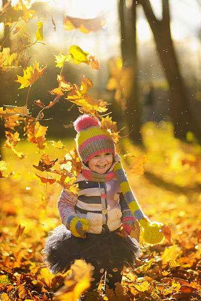 istock Girl in autumn park 492851454