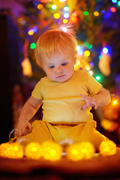 istock Little baby boy playing with illuminated toys 492851954