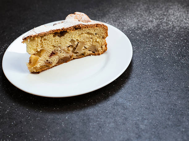 istock Piece of apple pie on a white plate 492852180