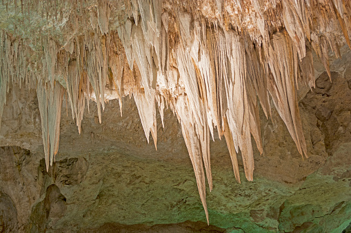 Colorful Stalactites by Cave Lighting in Carlsbad cavern in New Mexico