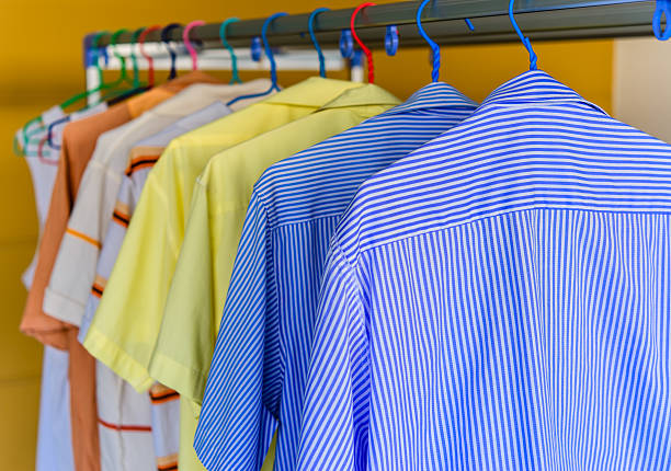 istock Blue shirt with white stripes wait for dry during 492860287