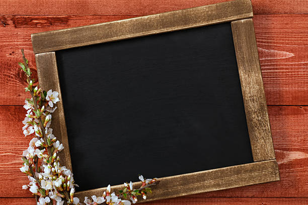 istock Old vintage school slate with flowers 492860301