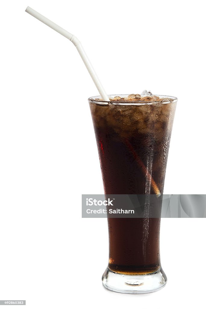 Cola with ice in glass isolated on white background. Cola with ice in glass isolated on white Blue Stock Photo