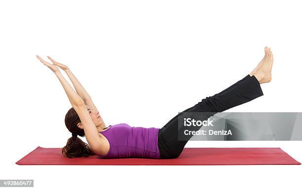 Woman Strengthening Her Abs During Fitness Stock Photo - Download Image Now - 30-34 Years, Abdominal Muscle, Active Lifestyle