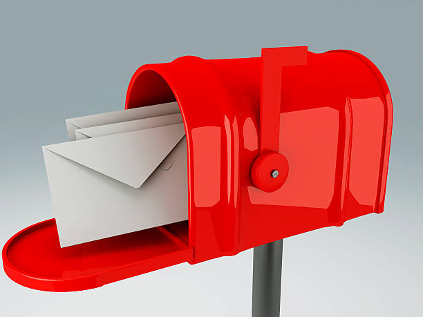 istock red mail box with heap of letters 492862335