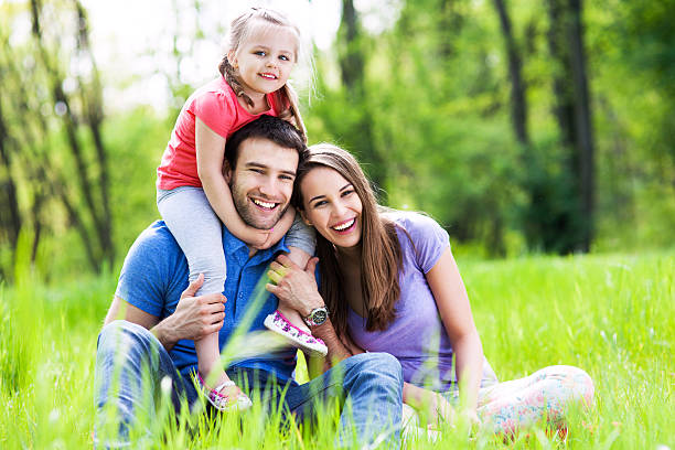 istock Young Family Bonding in Park 492863115