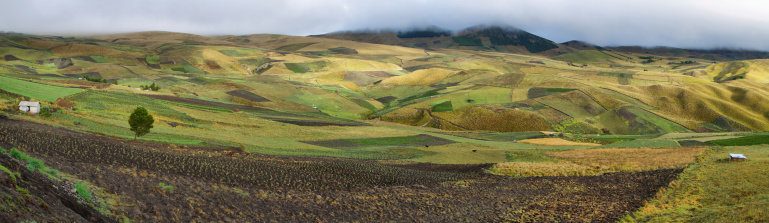 Panoramic view of colorful terrace fields between Latacunga and Zumbahua village, Ecuador