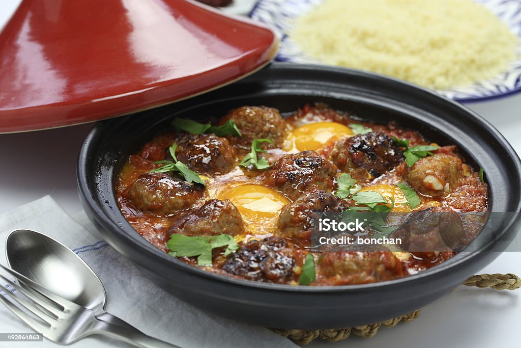 kofta tagine, kefta tagine, moroccan cuisine kofta tajine, kefta tagine, moroccan cuisine, lamb meatballs with eggs Tajine Stock Photo