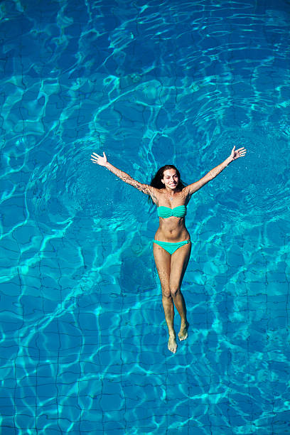 Young Woman Enjoying in Pool
