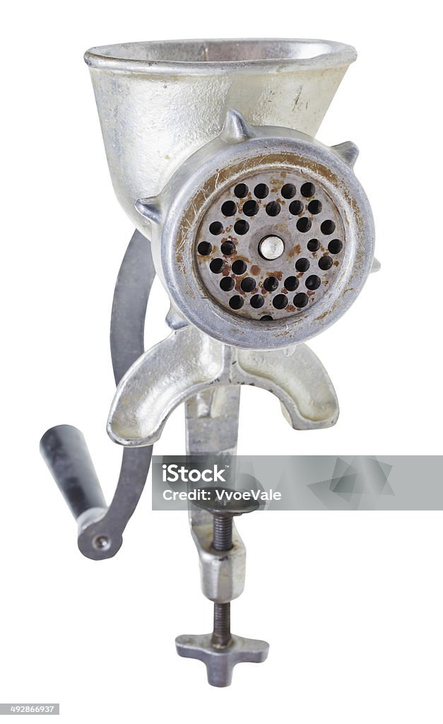 old iron meat mincer isolated on white old iron meat mincer isolated on white background Kitchen Stock Photo