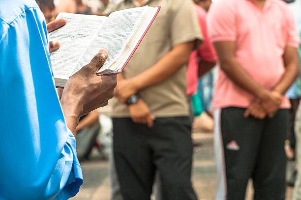 evangelical preacher Sao Paulo, Brazil, January 09, 2009. Hand with bible of the man evangelical preacher explains God's Word in Se Square in downtown Sao Paulo evangelic stock pictures, royalty-free photos & images