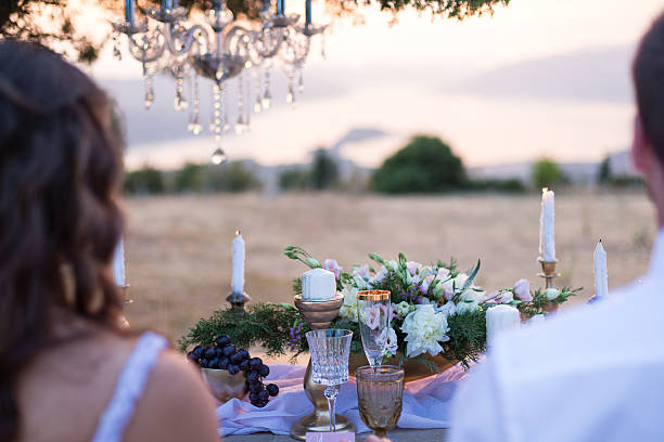 istock the bride and groom posing at sunset 492878766