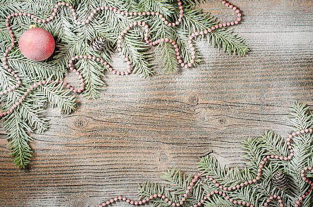 istock Christmas tree with decoration over old wooden background 492879684