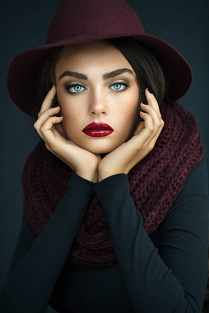 Beautiful girl with make-up and red hat