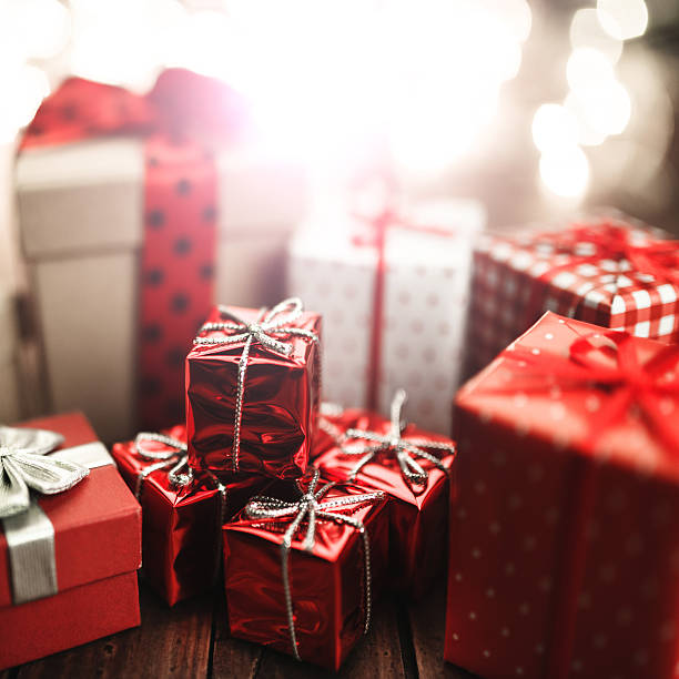 istock christmas gift with the red ribbon 492882406