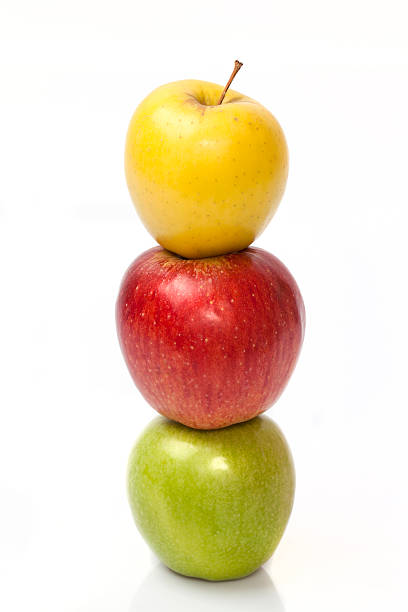 istock Yellow, green and red apples isolated on white 492882878