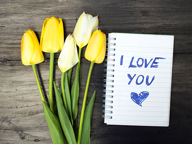 istock tulip bouquet and notepad with words 