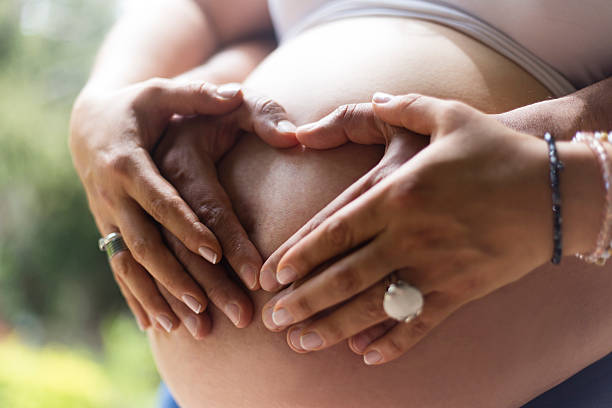 istock Pregnant woman belly 492884246