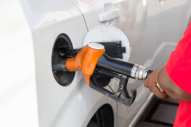 istock Petrol pump filling closeup 492884354