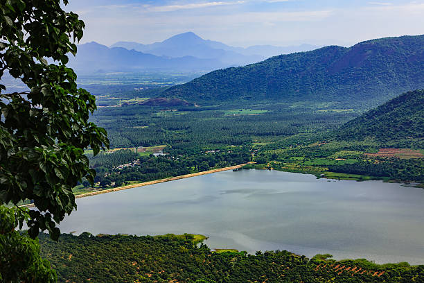 The Manjalar Dam across the Manjalar River at the foothills of the Palani Hills on the way to the Hill station of Kodaikanal. Photo shot in the afternoon sunlight; horizontal format. No people.