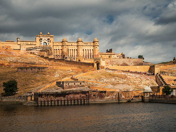 Amber fort and Maota lake Jaipur India View of Amber Fort in the morning and Maota lake amber fort stock pictures, royalty-free photos & images