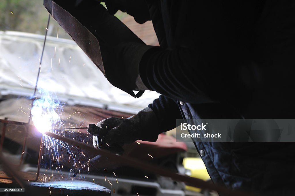 weld weld machine worker hard industry business Abstract Stock Photo