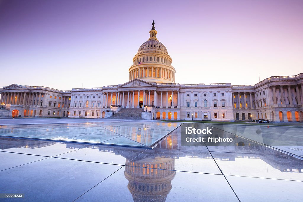 The United States Capitol building The United States Capitol building with the dome lit up at night. Capitol Building - Washington DC Stock Photo