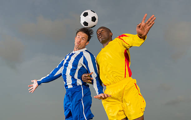 istock Two Footballers In Action 492901713