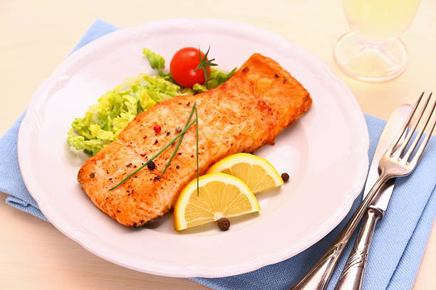 istock Grilled salmon, vegetables and wine 492903477
