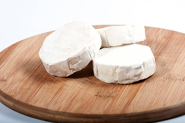 istock few pieces of cheese on a wooden board 492903623
