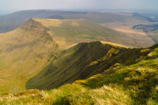 The mountain peak of Cribyn as seen from Pen-Y-Fan on a Spring afternoon. Situated in the Brecon Beacons national park, Cribyn makes up park of the Pen-Y-Fan horseshoe walk.