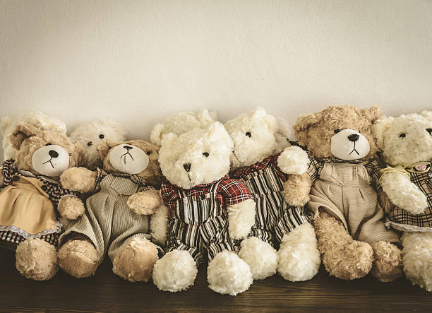 istock Group of cute teddy bears sitting together 492905026