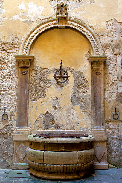 Ancient water well in Siena, Italy