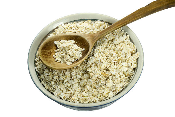 istock Oat Flakes On A Wooden Spoon 492906161