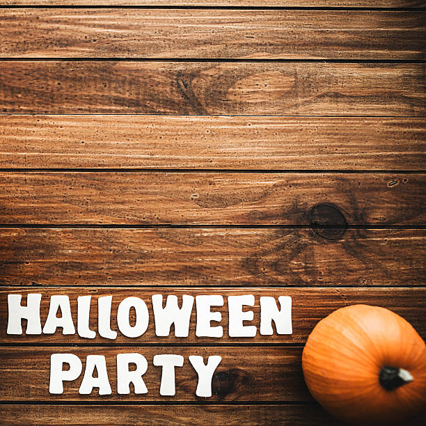 istock halloween pumpkin on rustic wood 492907356