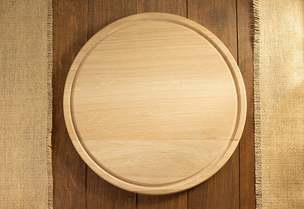 istock sack burlap and cutting board on wood 492907918