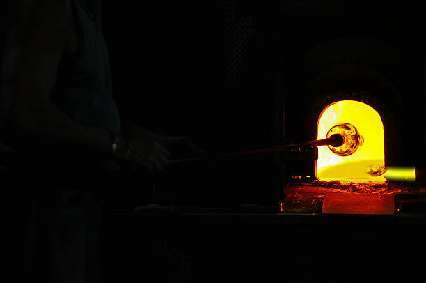 Close-Up Of Melting Glass In Factory
