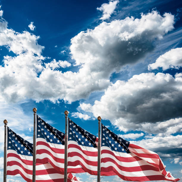 istock us national flag waving on the wind 492912342