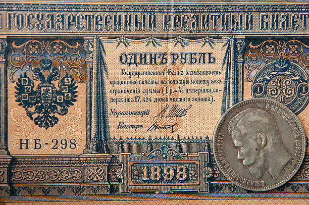 istock ancient Russian, silver coins and old banknotes Tsar Nicholas 492913254