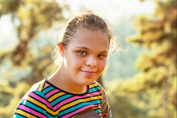 istock Down Syndrome Girl 492915796