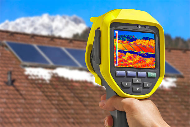 Recording Solar Panels with Thermal Camera Recording Photovoltaic Solar Panels on the roof House With Thermal Camera solar heater stock pictures, royalty-free photos & images