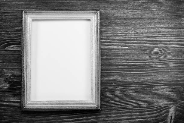 istock photo picture frame on wood 492917272