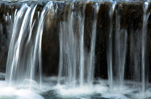 istock Poland.Small waterfall in the park.Horizontal 492919224