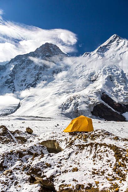 istock High Altitude Mountains and One Orange Tent 492932634