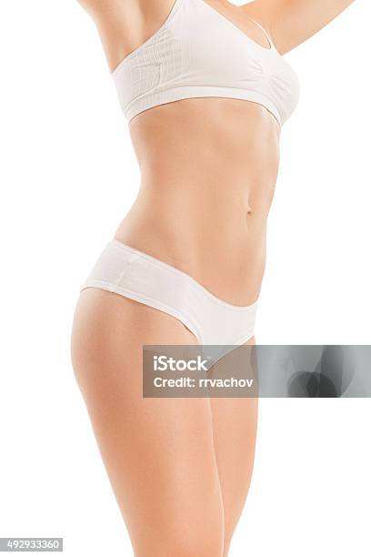 Cuerpo De Mujer Con Estómago Con Pantalla Plana Foto de stock y más banco de imágenes de Mujeres - Mujeres, Nalga, Perfección