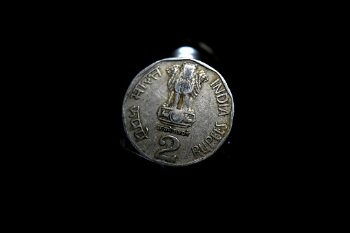 The beautiful Indian coin photograph with black background.