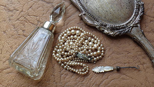 istock Vintage Ladies Perfume Bottle + Necklace 492937914