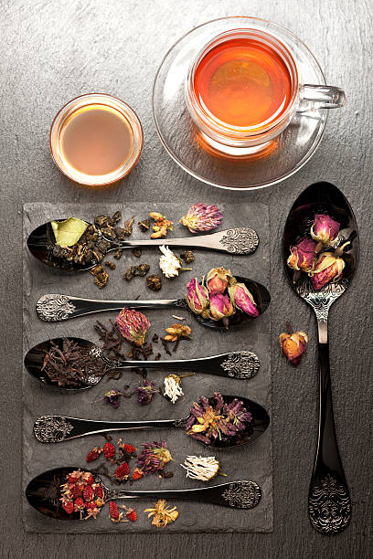 istock Various teas and dried herbs in a vintage spoon. 492939132